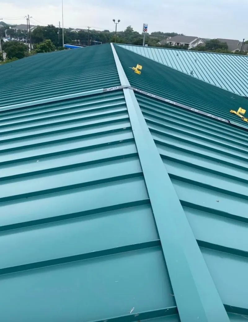 Green commercial metal roof ridge and valley for Metal Roof Repair in Depew