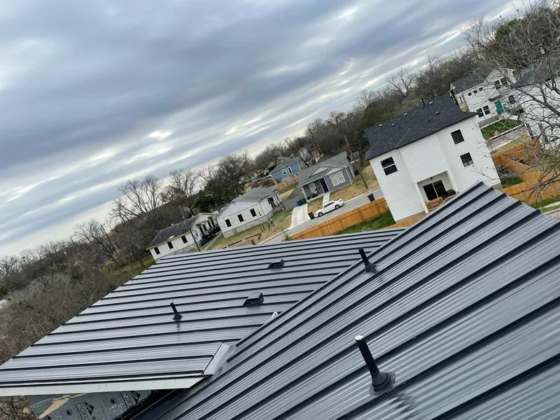 Standing seam metal roof panels with vents for Skylight Repair in Depew